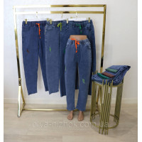 Джинси жіночі стрейч блакитні з потертостями та яскравим ременем Напівбатал 28-33 KENALIN